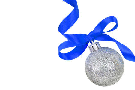 Christmas silver ball with blue ribbon isolated on whiteの写真素材