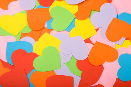 Background of multicolored paper heartsの写真素材