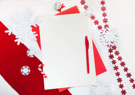 Top view of Christmas blank wish list or empty letter for Santa Claus with christmas decoration....