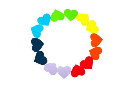 Circle frame with rainbow colors hearts isolated on white background. Valentines Day wreath with paper art origami style hearts. LGBT symbolの写真素材