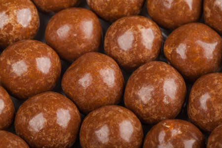 Close up of chocolate candy balls. Confectionery textered background..の写真素材