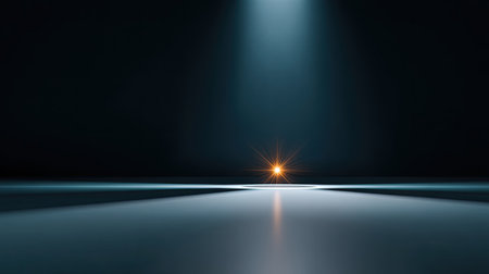 A captivating image featuring a single bright light beam cutting through darkness, casting reflections on a smooth surface, perfect for creative projects and visual storytelling.の素材