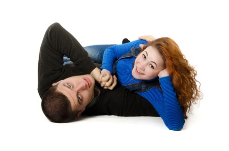 Couple in love hugging, White studio background.の写真素材