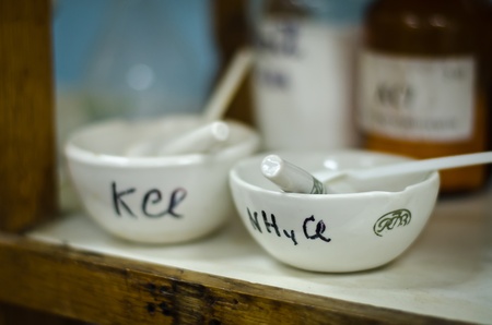 Chemical mortar and pestle. Shallow dof. front one in focus.