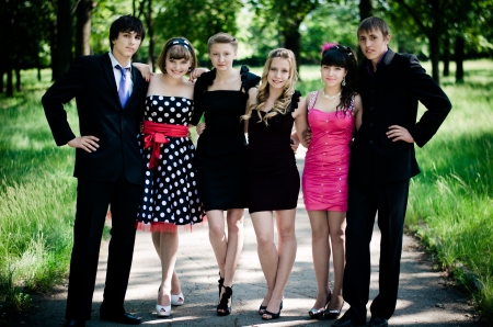 Six best friends smiling happy in a summer park.の写真素材