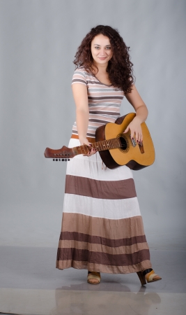 Girl in a bright light dressの写真素材