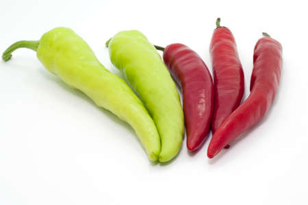 the selective focus of chili over white background. healthy diet concept.の写真素材