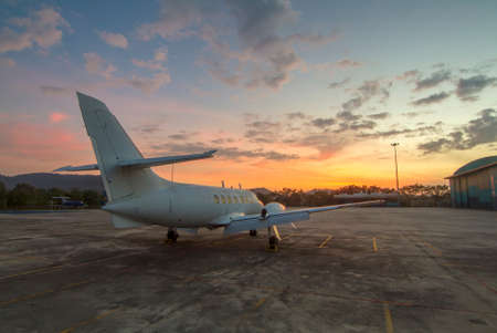 Small aircraft at the beautiful sunriseの写真素材