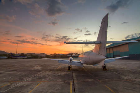 Small aircraft at the beautiful sunriseの写真素材