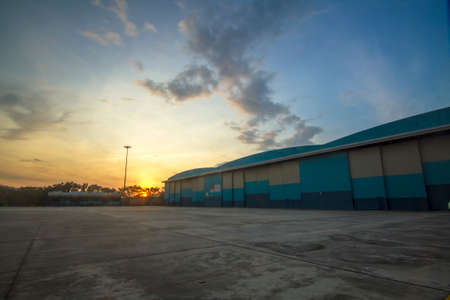 hangar in aerodrome at the beautiful sunriseの写真素材