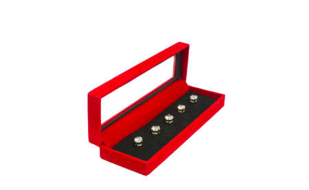diamond buttons in a velvet red boxの写真素材