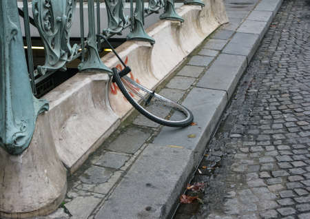 a broken bicycle wheel is all that's left in Paris, Franceの写真素材