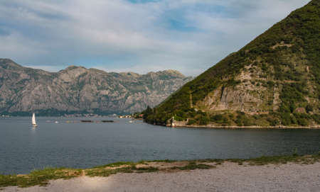 landscape with a yacht on the Bay of Kotorの写真素材