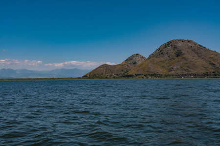 landscape with mountains on the skadar lake in montenegroの写真素材