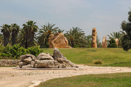 stone pillars stand in a circle in a park in Israelの写真素材