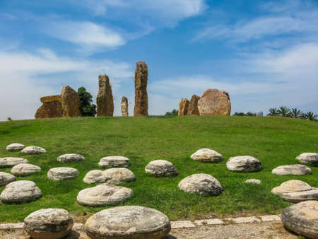stone pillars stand in a circle in a park in Israelの写真素材