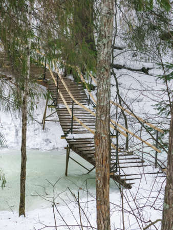small bridge over the stream in the natural park Olenyi brooks in the Sverdlovsk regionの写真素材