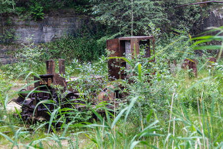 old rusty tractor abandoned in the career of an old lens in the Sverdlovsk regionの写真素材