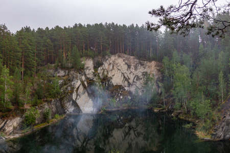 fog over the Talc stone quarry in the Sverdlovsk regionの写真素材