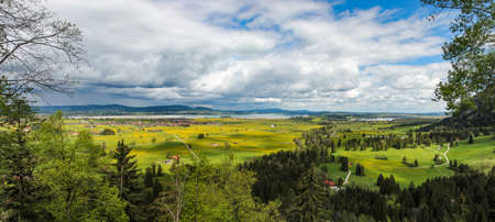 view of the Schwangau valley and the lake Forggensee neighborhood in Bavaria Stitched Panoramaの写真素材
