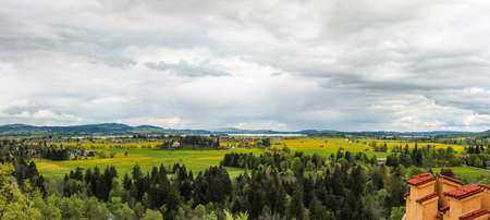 view of the Schwangau valley and the lake Forggensee neighborhood in Bavaria Stitched Panoramaの写真素材