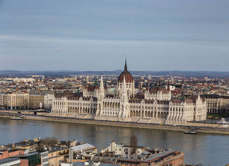 view of the embankment of the river Danube and old Parliament building in Budapest , Hungary