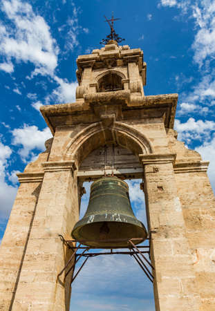 The bell tower of Miguelete in Valencia is an ancient structure, operating today not only as a belfry, but also as a viewing platform popular with tourists., Spainの写真素材