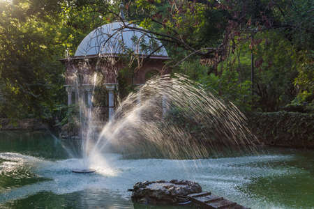 Romantic Pavillion of King Alfonso XII and fountain in the park of Maria Luisa in Seville, Spain.の写真素材