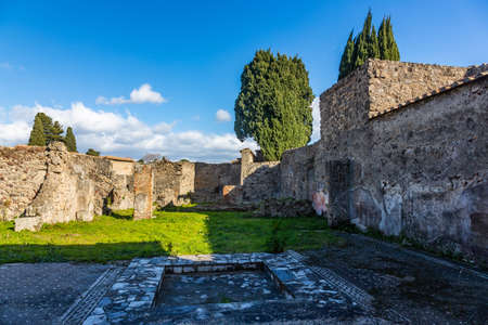 A fascinating journey through the ruins of the ancient city of Pompeii located at the foot of the volcano Vesuvius, Italyの写真素材