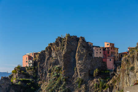 Cinque Terre coast and small towns with vibrant colorful houses in La Spezia, Italy.の写真素材