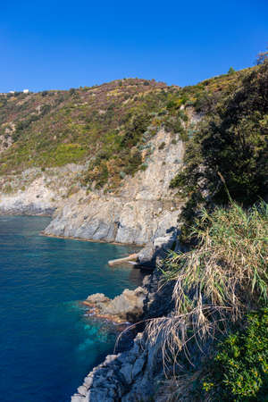 Cinque Terre coast and small towns with vibrant colorful houses in La Spezia, Italy.の写真素材