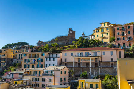 Cinque Terre coast and small towns with vibrant colorful houses in La Spezia, Italy.の写真素材