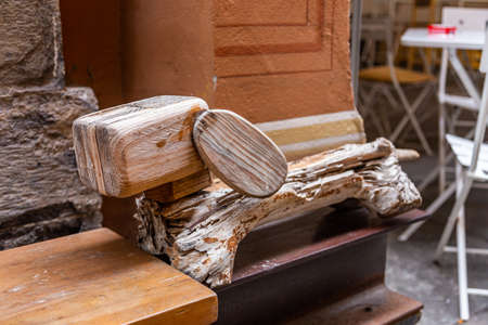 Wood art installation - Dachshund dog on a street in the city of Savonaの写真素材