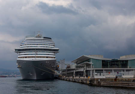 Large white cruise ship in the port of Savona, Italyの写真素材