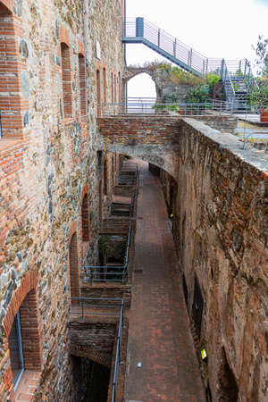 The stone walls of the casemates in an ancient fortress in Savona, Italyのeditorial素材