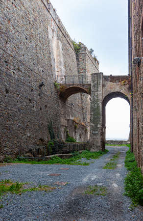 The stone walls of the casemates in an ancient fortress in Savona, Italyのeditorial素材