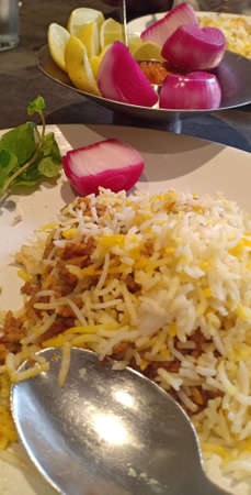 Chicken biryani is a dish that originated in India but is popular throughout the middle east and in particular Saudi Arabia. It is made with meat, rice, and spices and is traditionally eatの写真素材