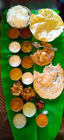 south indian breakfast food on banana leafの写真素材