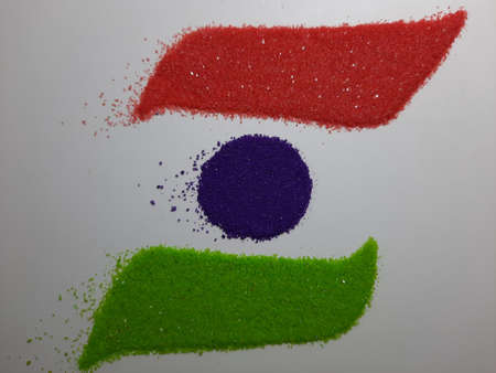 Indian Independence Day celebration background concept. Symbolic flag colors, red, green and orange powders color splashed over white background.の写真素材