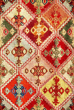 Seamless pattern with abstract ethnic ornament on old paper texture.の写真素材