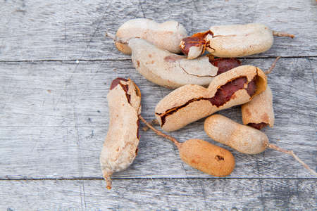 Tamarind on the old white woodenの写真素材