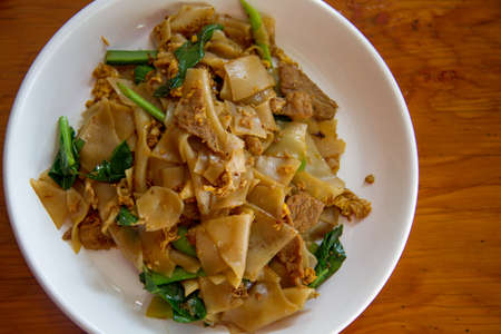 Fired thin noodles with soy sauce / Thai foodの写真素材