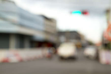 Abstract urban background with blurred buildings and street shallow depth of focusの写真素材