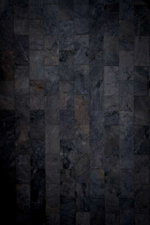 dirty dark marble wall tile texture backgroundの写真素材