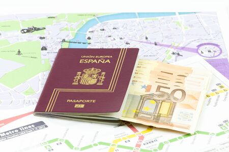 With Spanish passport european union currency banknotes on Prague map