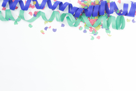 confetti and streamers on white backgroundの写真素材