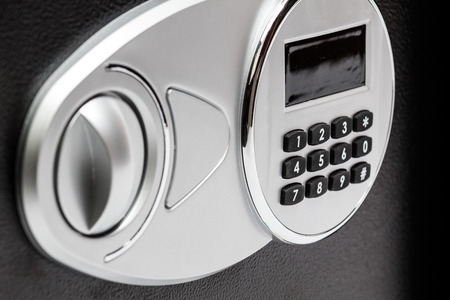 Numeric keypad of safe deposit box, close-up, protection, lock, security.