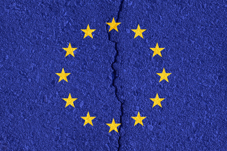 European Union flag on cracked wall texture background. Symbol, Politic Concept.の写真素材