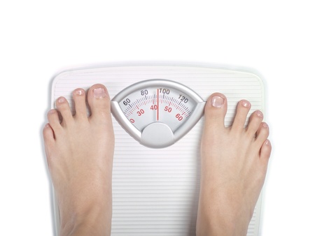 Feet on diet bathroom scale