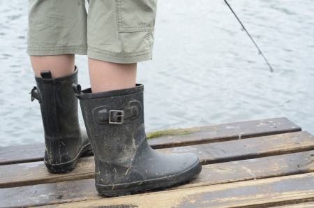 Fishing rod and bootsの写真素材